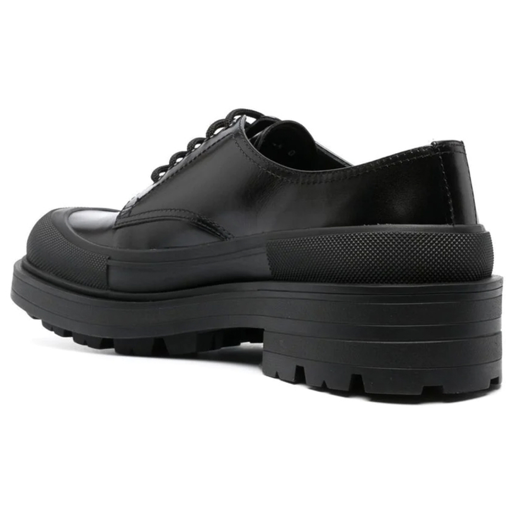 Alexander McQueen Tread Slick logo