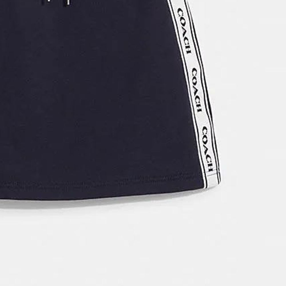 COACH/ SS23