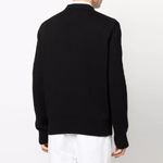 Alexander McQueen x SS22 logo