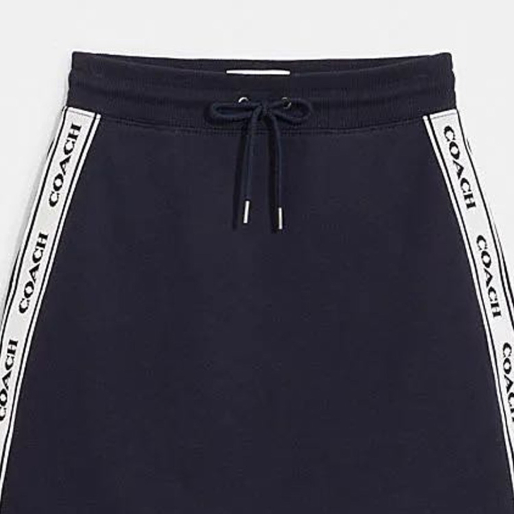 COACH/ SS23