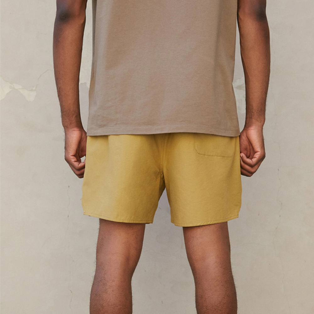 Fear of God Essentials FW21 Volley Short Amber Logo