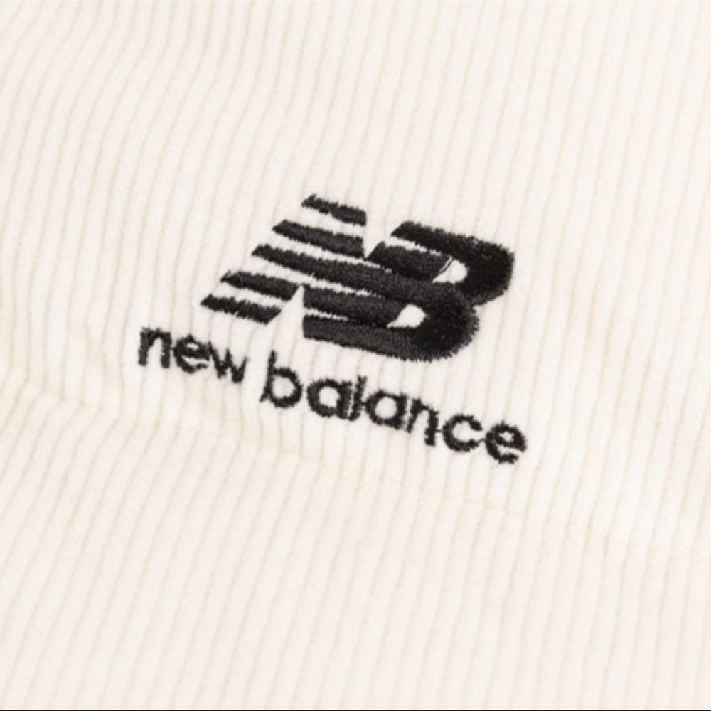 New Balance UNI Active logo